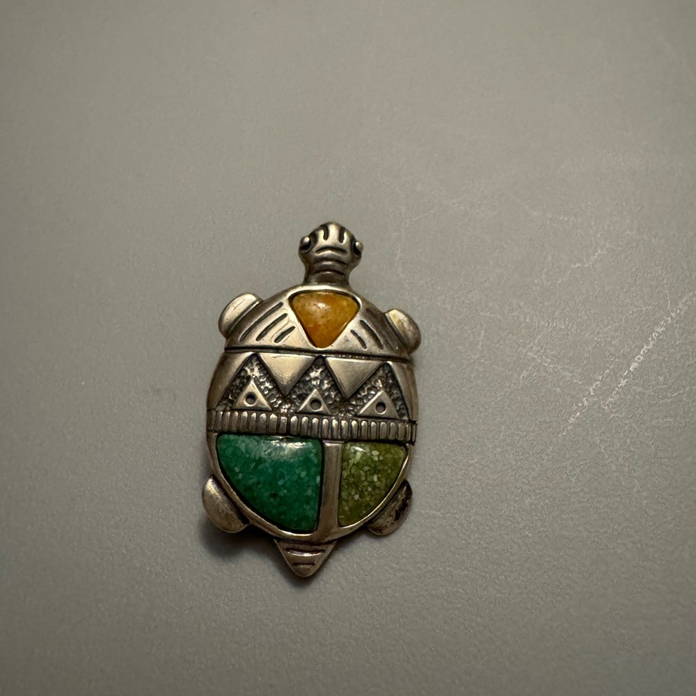 Carolyn Pollack turtle pin and pendant in sterling silver and stones.